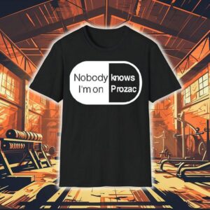 Robbie Williams Wearing Noboydy I’m On Knows Prozac Shirt