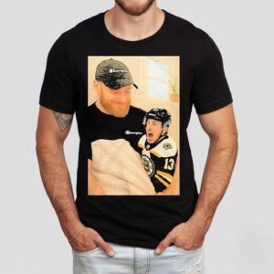 Sam Bennett Holding A Crying Brad Marchand Baby Shirt