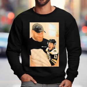 Sam Bennett Holding A Crying Brad Marchand Baby Sweatshirt