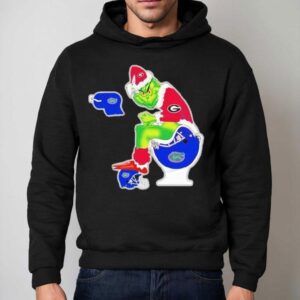 The Grinch Georgia Bulldogs Sitting On Toilet Florida Gators Xmas Holiday Christmas Shirt 2 The Grinch Georgia Bulldogs Sitting On Toilet Florida Gators Xmas Holiday Christmas Hoodie