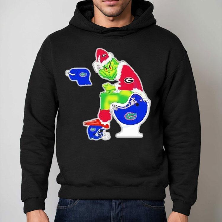 The Grinch Georgia Bulldogs Sitting On Toilet Florida Gators Xmas Holiday Christmas Shirt The Grinch Georgia Bulldogs Sitting On Toilet Florida Gators Xmas Holiday Christmas Shirt