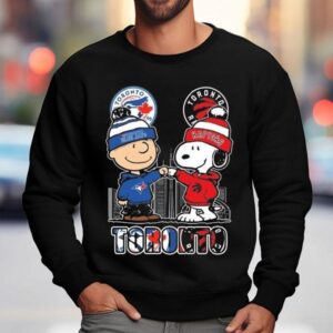 Charlie Brown Toronto Blue Jays And Snoopy Toronto Raptors Skyline 2025 Shirt 3 Charlie Brown Toronto Blue Jays And Snoopy Toronto Raptors Skyline Sweatshirt