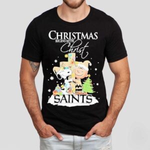 Snoopy And Charlie Brown The Peanuts X New Orleans Saints Merry Christmas Begins With Christ Shirt Snoopy And Charlie Brown The Peanuts X New Orleans Saints Merry Christmas Begins With Christ Shirt