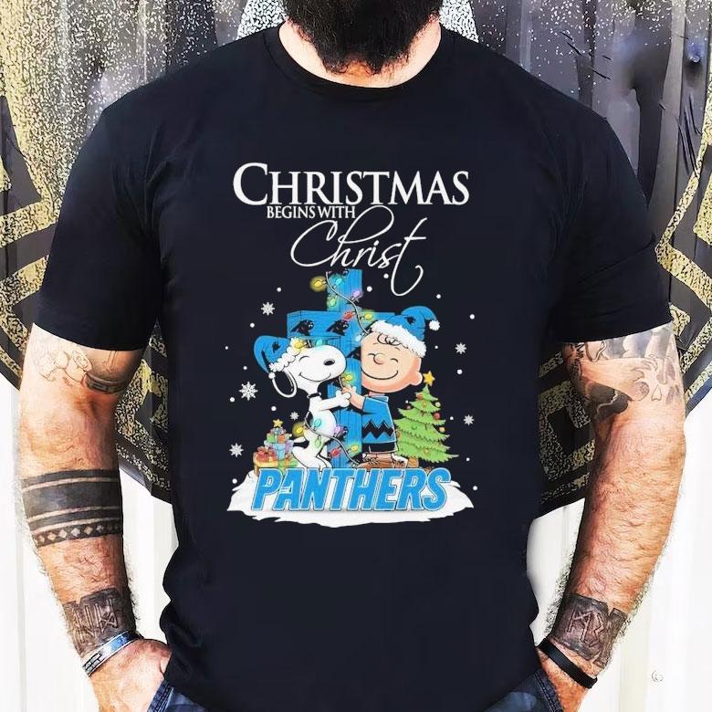 Snoopy And Charlie Brown The Peanuts X Carolina Panthers Merry Christmas Begins With Christ Shirt Snoopy And Charlie Brown The Peanuts X Carolina Panthers Merry Christmas Begins With Christ Shirt