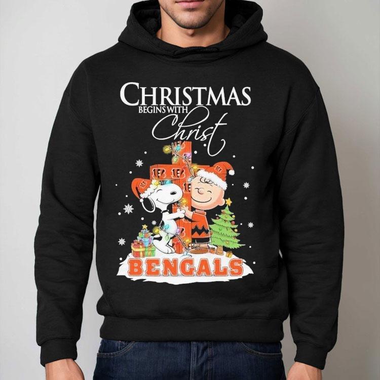 Snoopy And Charlie Brown The Peanuts X Cincinnati Bengals Merry Christmas Begins With Christ Shirt Snoopy And Charlie Brown The Peanuts X Cincinnati Bengals Merry Christmas Begins With Christ Shirt