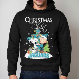 Snoopy And Charlie Brown The Peanuts X Jacksonville Jaguars Merry Christmas Begins With Chris Hoodie