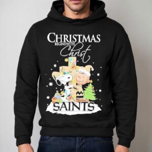 Snoopy And Charlie Brown The Peanuts X New Orleans Saints Merry Christmas Begins With Christ Shirt 2 Snoopy And Charlie Brown The Peanuts X New Orleans Saints Merry Christmas Begins With Chris Hoodie