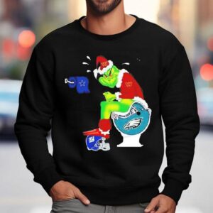 Grinch Washington Commanders Shit On Philadelphia Eagles Helmet Toilet Christmas Shirt 3 Grinch Washington Commanders Shit On Philadelphia Eagles Helmet Toilet Christmas Sweatshirt