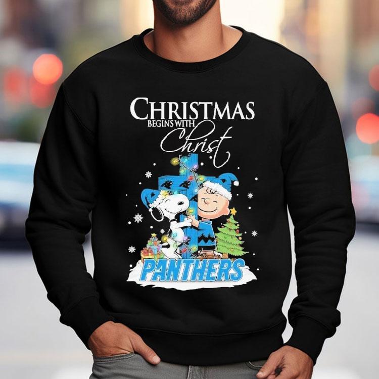 Snoopy And Charlie Brown The Peanuts X Carolina Panthers Merry Christmas Begins With Christ Shirt Snoopy And Charlie Brown The Peanuts X Carolina Panthers Merry Christmas Begins With Christ Shirt