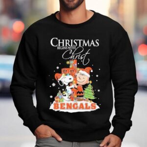 Snoopy And Charlie Brown The Peanuts X Cincinnati Bengals Merry Christmas Begins With Christ Shirt 3 Snoopy And Charlie Brown The Peanuts X Cincinnati Bengals Merry Christmas Begins With Chris Sweatshirt