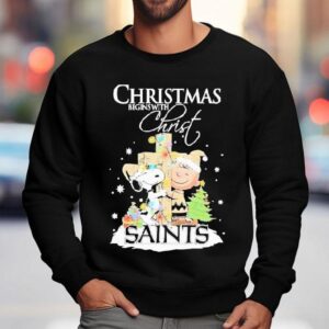 Snoopy And Charlie Brown The Peanuts X New Orleans Saints Merry Christmas Begins With Christ Shirt 3 Snoopy And Charlie Brown The Peanuts X New Orleans Saints Merry Christmas Begins With Chris Sweatshirt