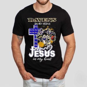 Baltimore Ravens In My Veins Jesus In My Heart Features A Football Player Logos Cross Shirt