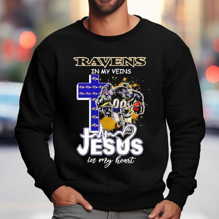 Baltimore Ravens In My Veins Jesus In My Heart Features A Football Player Logos Cross Shirt Baltimore Ravens In My Veins Jesus In My Heart Features A Football Player Logos Cross Shirt