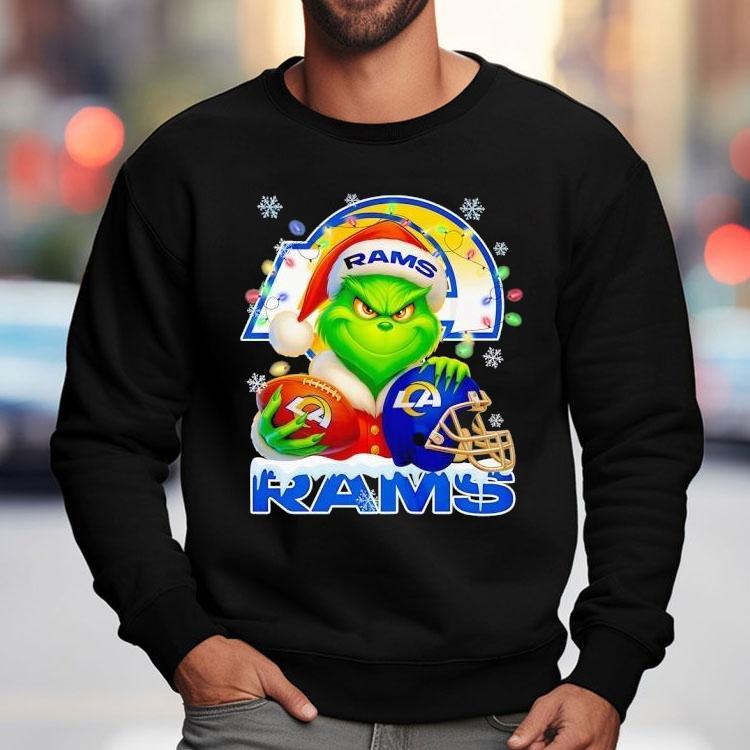 Grinch Holding Football And Helmet Los Angeles Rams Merry Christmas Shirt Grinch Holding Football And Helmet Los Angeles Rams Merry Christmas Shirt