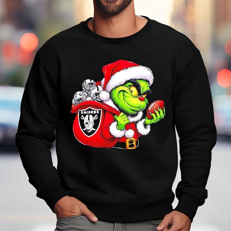 Grinch Holding Las Vegas Raiders Grinchmas Shirt Grinch Holding Las Vegas Raiders Grinchmas Shirt